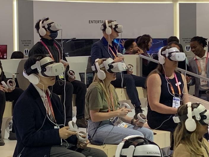 <div class="inline-image__caption"><p>A group shopping VR demo at Las Vegas Convention Center’ central hall.</p></div> <div class="inline-image__credit">Mike Brunker</div>