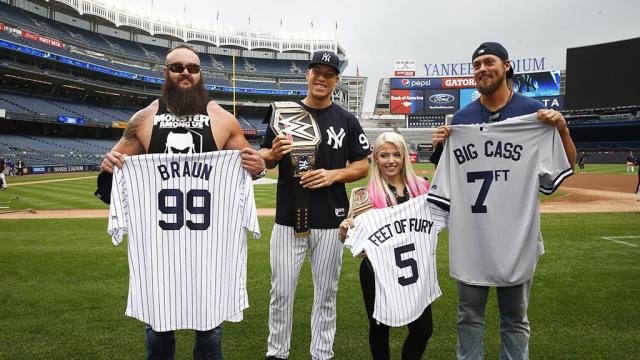 Aaron Judge gets dwarfed for once as WWE stars present him with a title belt