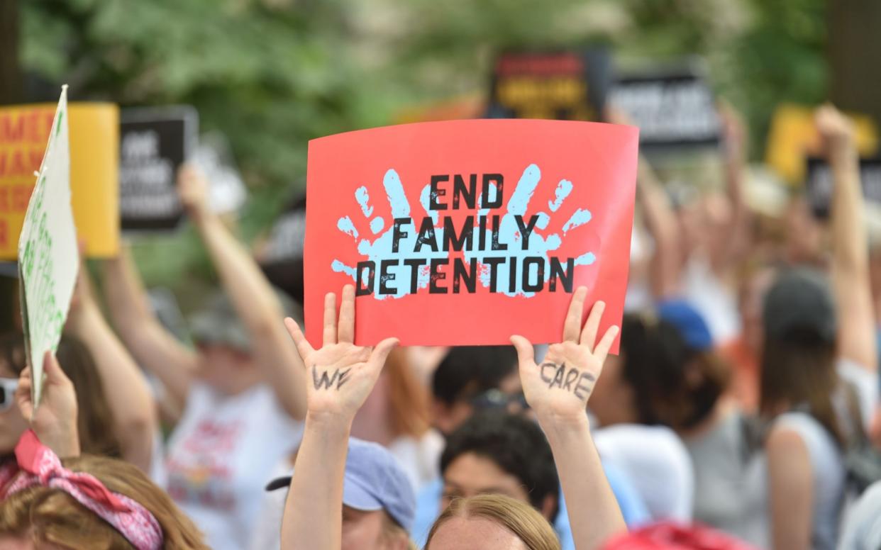 People demonstrate in Washington, DC, on June 28, 2018, demanding an end to the separation of migrant children from their parents - AFP