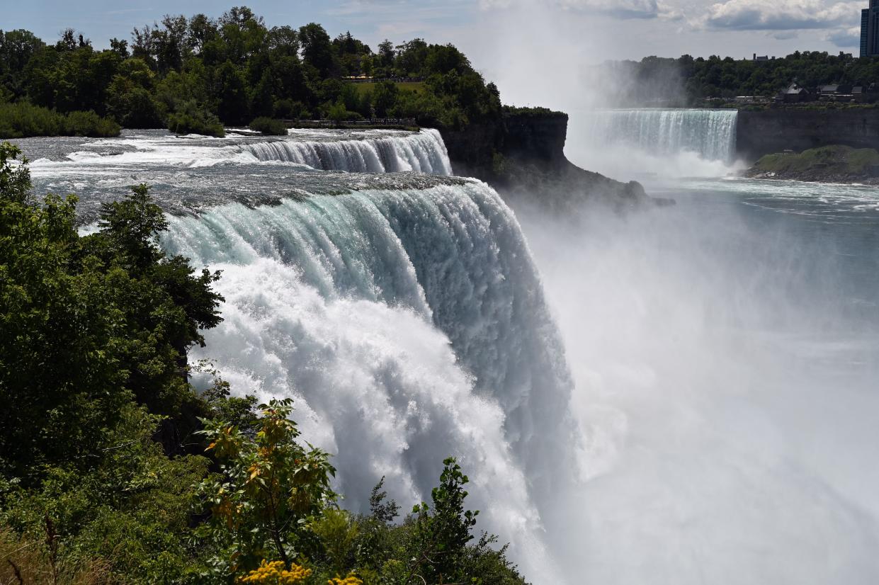 A general view shows water flowing over Niagara Falls in Niagara Falls, New York, on Aug. 13, 2022.