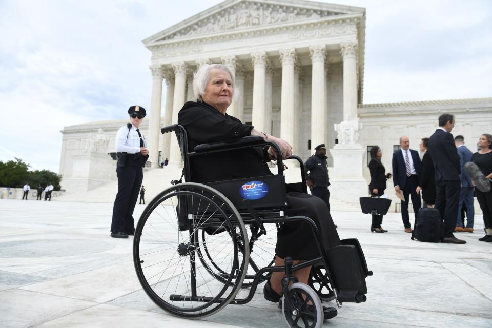 Transgender activist Aimee Stephens sits in her wheelchair outside the Supreme Court in Washington, D.C., October 8, 2019. (Photo: SAUL LOEB via Getty Images)