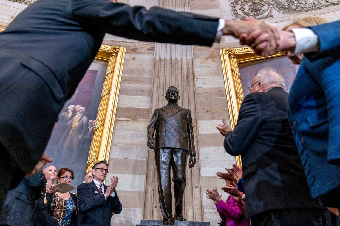 Former President Harry S. Truman’s eldest grandson Clifton Truman Daniel, center left, accompanied by Congressional leadership and members of the Missouri Congressional Delegation, applaud after unveiling the Congressional statue of the former president during a ceremony in the Rotunda of the U.S. Capitol Building in Washington, Thursday, Sept. 29, 2022. (AP Photo/Andrew Harnik) Andrew Harnik/AP