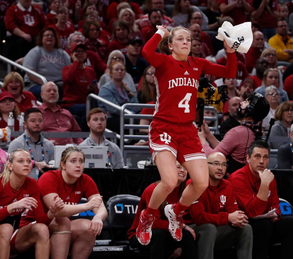 Indiana Hoosiers guard Nicole Cardano-Hillary (4) cheers from the bench during the women’s Big Ten tournament game against the Ohio State Buckeyes, Saturday, March 5, 2022, at Gainbridge Fieldhouse in Indianapolis. Indiana won 70-62. 