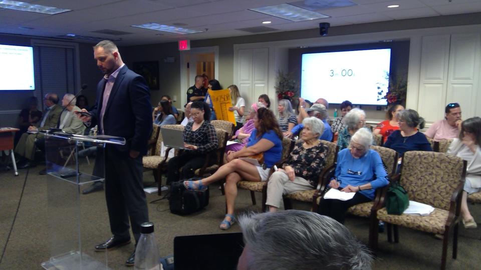 Aaron Hakim, president of AMCO Development,
details the proposed project during the Feb. 21 Mount
Dora City Council meeting.