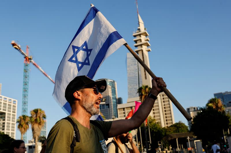 FILE PHOTO: Israeli military reservists sign pledge to suspend voluntary military service if the government passes judicial overhaul legislation near the defence ministry in Tel Aviv