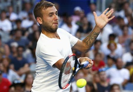 Tennis - Australian Open - Melbourne Park, Melbourne, Australia - 22/1/17 Britain's Daniel Evans hits a shot during his Men's singles fourth round match against France's Jo-Wilfried Tsonga. REUTERS/Edgar Su