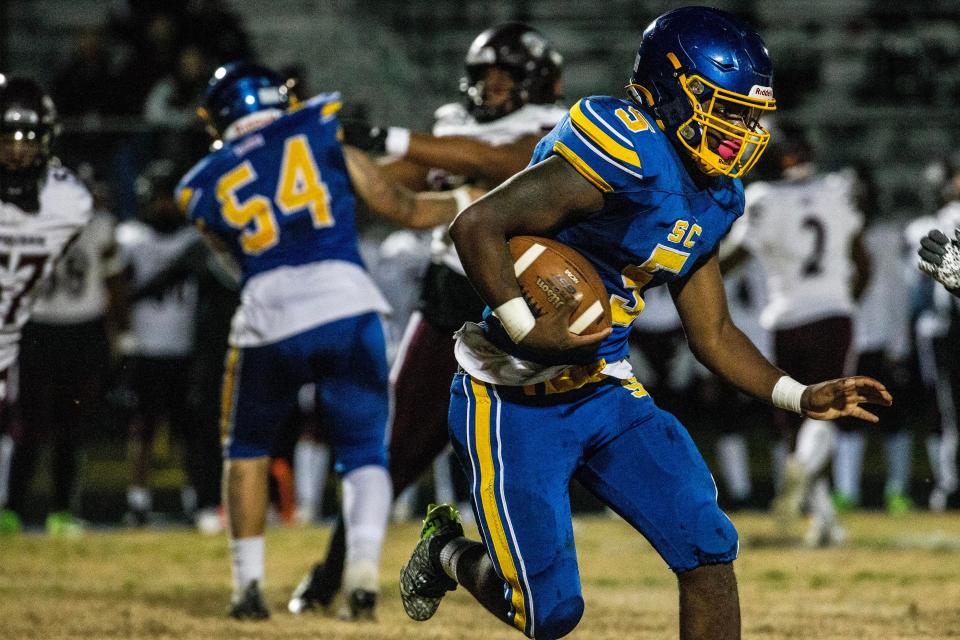 Sussex Central junior Malik Bell (5) runs the ball against Appoquinimink during the DIAA Class 3A football playoffs at Sussex Central in Georgetown, Friday, Nov. 17, 2023. Sussex Central won 28-7.