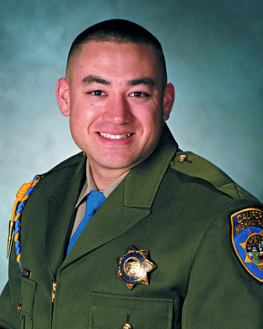 In this undated photo released by the California Highway Patrol is Officer Brian Law. The California Highway Patrol was mourning the loss of two officers Monday, Feb. 17, 2014, after their squad car flipped over while responding to a multi-vehicle crash. Officers Brian Law and Juan Gonzalez were heading to the crash on state Route 99 near the Central Valley town of Kingsburg, Calif., the CHP said. (AP Photo/California Highway Patrol)
