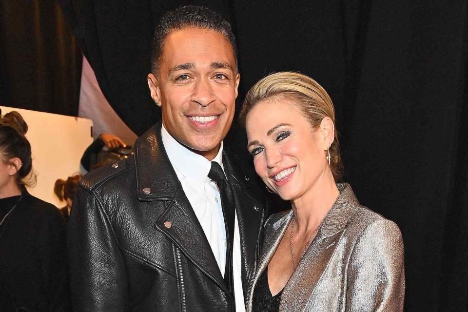 <p>Roy Rochlin/Getty Images for iHeartRadio)</p> T.J. Holmes and Amy Robach 