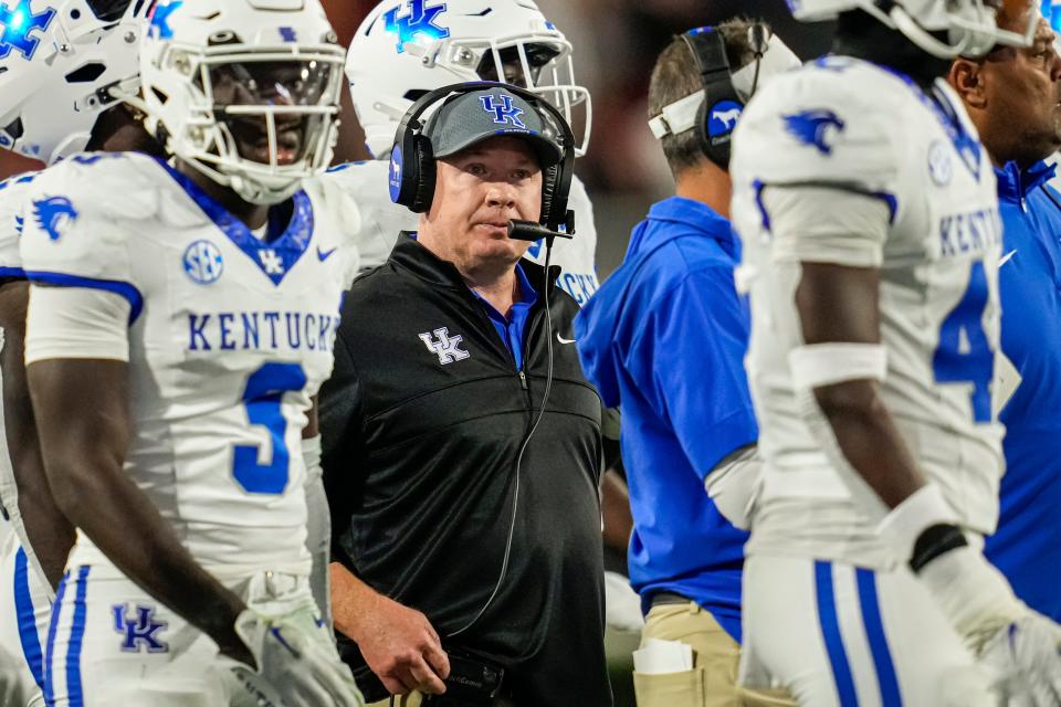 Kentucky Wildcats head coach Mark Stoops on the field against the Georgia Bulldogs at Sanford Stadium last weekend.