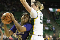 Alcorn State guard Diamond Hall (15) goes up for a shot while Baylor forward Caitlin Bickle (51) defends in the second half of an NCAA college basketball game in Waco, Texas, Wednesday, Dec. 8, 2021. (AP Photo/Emil Lippe)