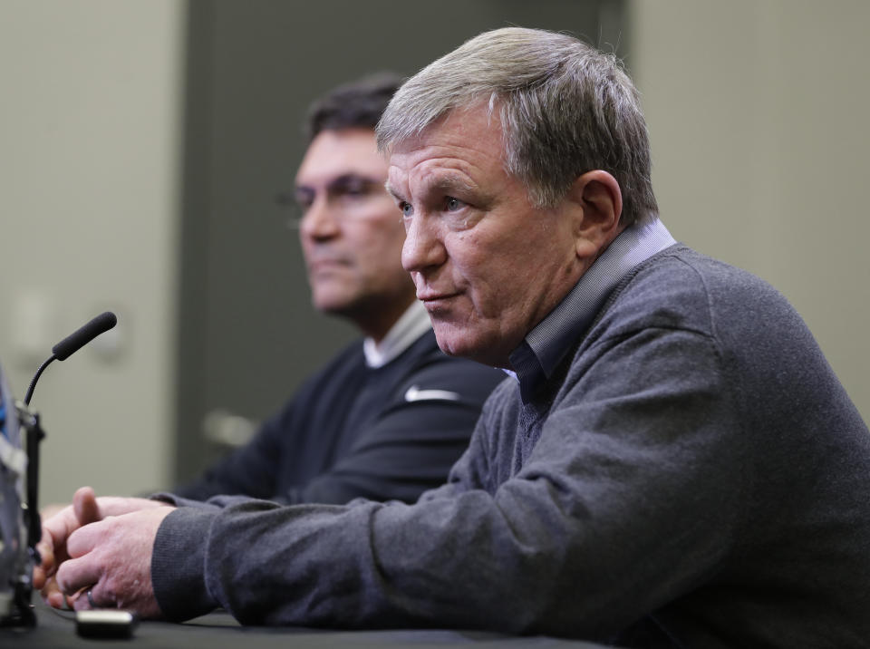 Former Carolina Panthers general manager Marty Hurney, front, rejoins Ron Rivera, back, with the Washington Football Team. (AP Photo/Chuck Burton)