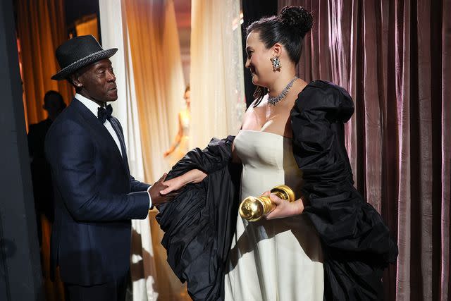 <p>Christopher Polk/Golden Globes 2024/Golden Globes 2024 via Getty</p> Don Cheadle and Lily Gladstone