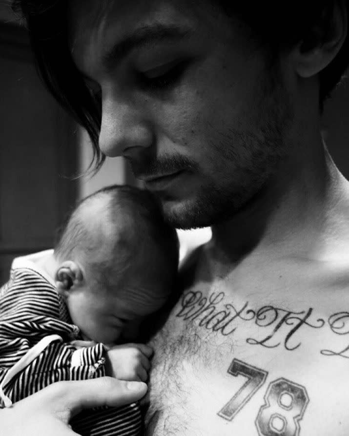 One Direction just got a little bit bigger! Louis Tomlinson shared the first photo of his adorable newborn son Freddie who was born on Jan. 21, 2016. In it, a shirtless and tattooed Tomlinson cradles his precious pint-sized son, the first One Direction member to be a father.