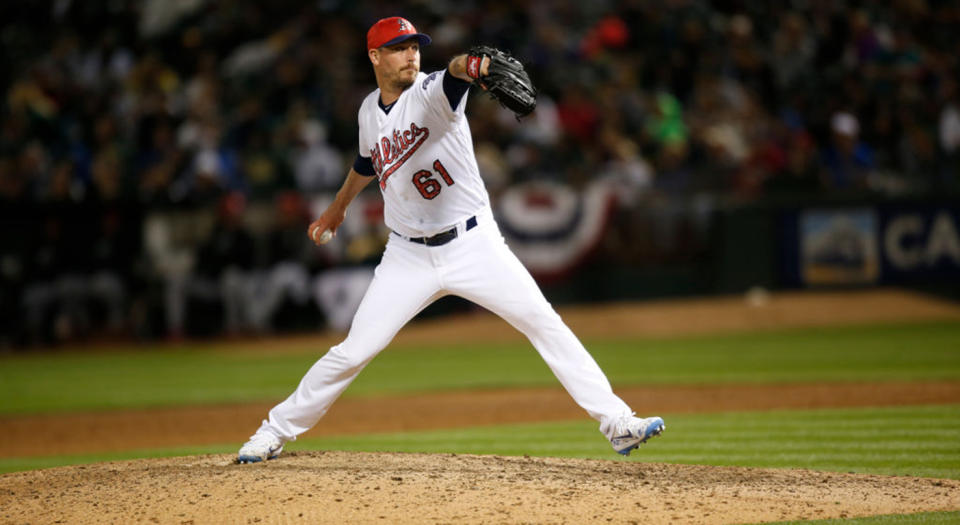 John Axford could be nifty add for the Blue Jays. (Michael Zagaris/Oakland Athletics/Getty Images)