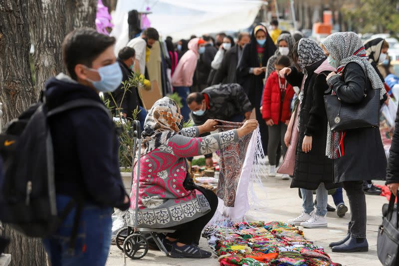 Iranians prepare to celebrate the new year, restricted by the pandemic