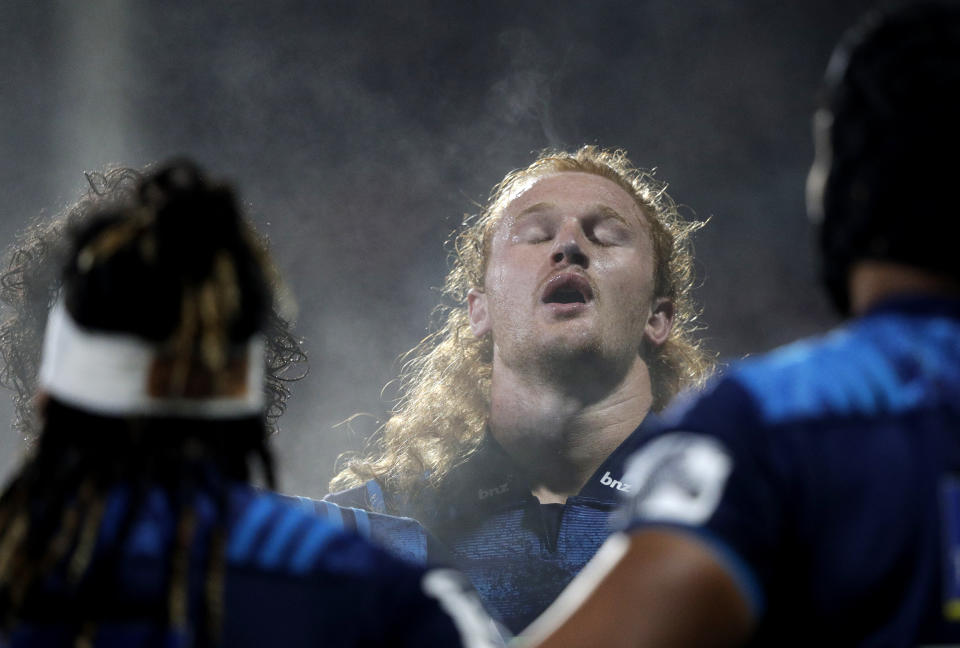 Blues Tom Robinson reacts during a break in their Super Rugby match against the Crusaders in Christchurch, New Zealand, Saturday, May 25, 2019. (AP Photo/Mark Baker)