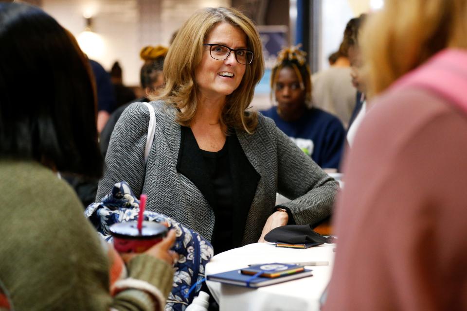 New Xavier University President Colleen Hanyzc converses with students during a reception at the Gallagher Student Center on the Xavier University campus in Cincinnati's Evanston neighborhood in the fall of 2021.