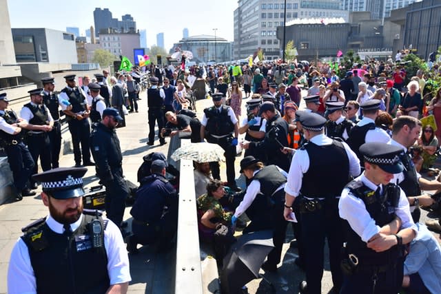 Police remove Extinction Rebellion demonstrators on Waterloo Bridge 