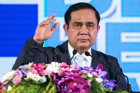 Thailand's Prime Minister Prayuth Chan-ocha gestures as he speaks during a ceremony marking the National Anti-Human Trafficking Day at the Government House in Bangkok June 5, 2015. REUTERS/Athit Perawongmetha