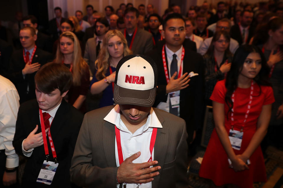 <p>Attendees stand for the pledge of allegiance during the Conservative Political Action Conference at the Gaylord National Resort and Convention Center, Feb. 23, 2018 in National Harbor, Md. (Photo: Chip Somodevilla/Getty Images) </p>