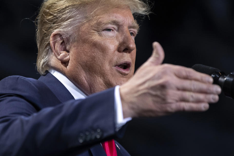 President Donald Trump speaks during a campaign rally at Kellogg Arena, Wednesday, Dec. 18, 2019, in Battle Creek, Mich. (AP Photo/ Evan Vucci)