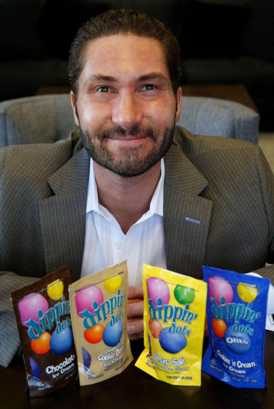 Dippin' Dots CEO Scott Fischer shows some of his company's product Jan. 24, 2017, at the headquarters in Oklahoma City.