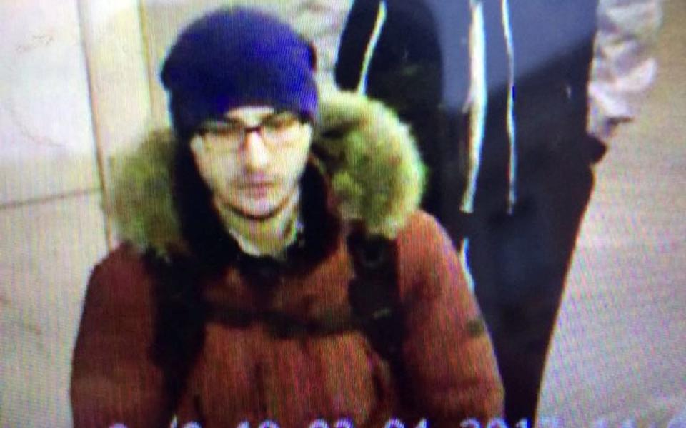 Suspect Akbarzhon Jalilov walking at St Petersburg's metro station  - Credit: 5th Channel Russia/via Reuters 