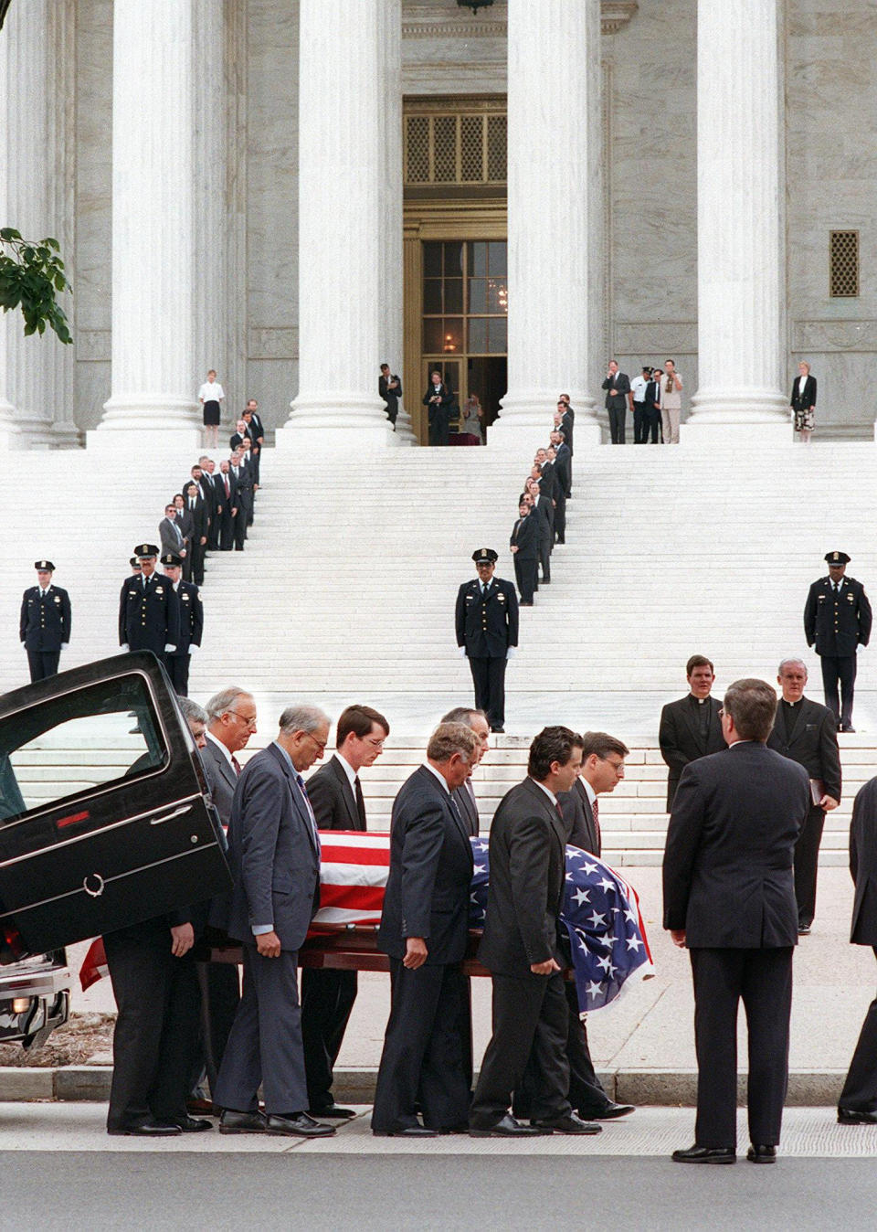 The body of former&nbsp;Justice William Brennan is carried out of the hearse before being&nbsp;taken into the Supreme Court on July 28, 1997, where he&nbsp;then lay in repose.