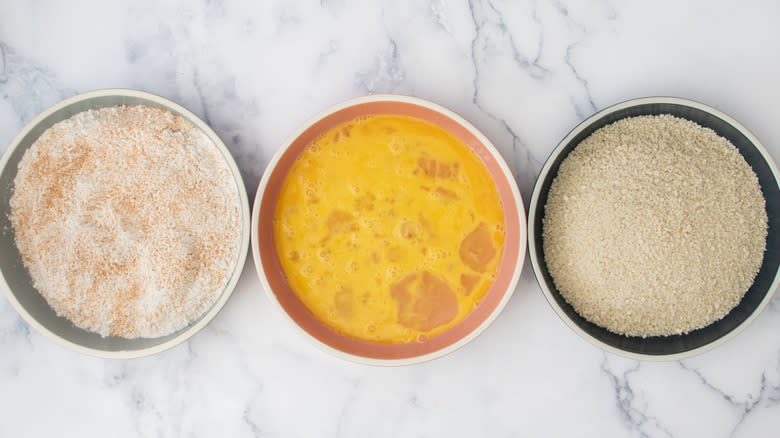 flour eggs breadcrumbs in bowls