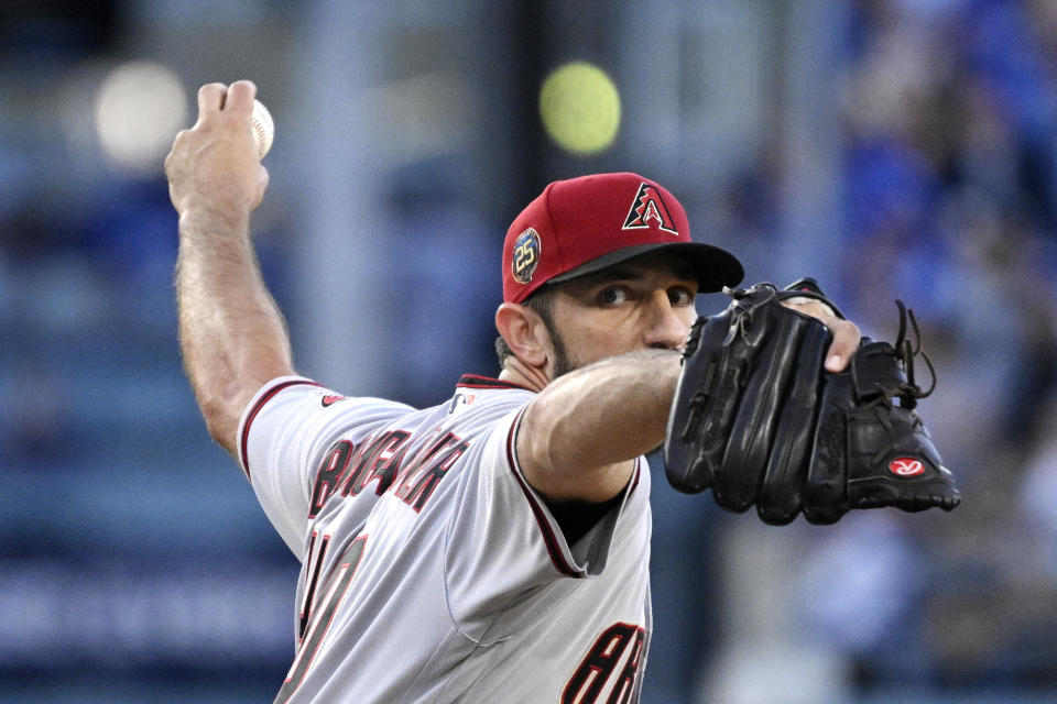 Arizona Diamondbacks starting pitcher Madison Bumgarner throws to the plate during the first inning of a baseball game against the Los Angeles Dodgers, Saturday, April 1, 2023, in Los Angeles. (AP Photo/Mark J. Terrill)
