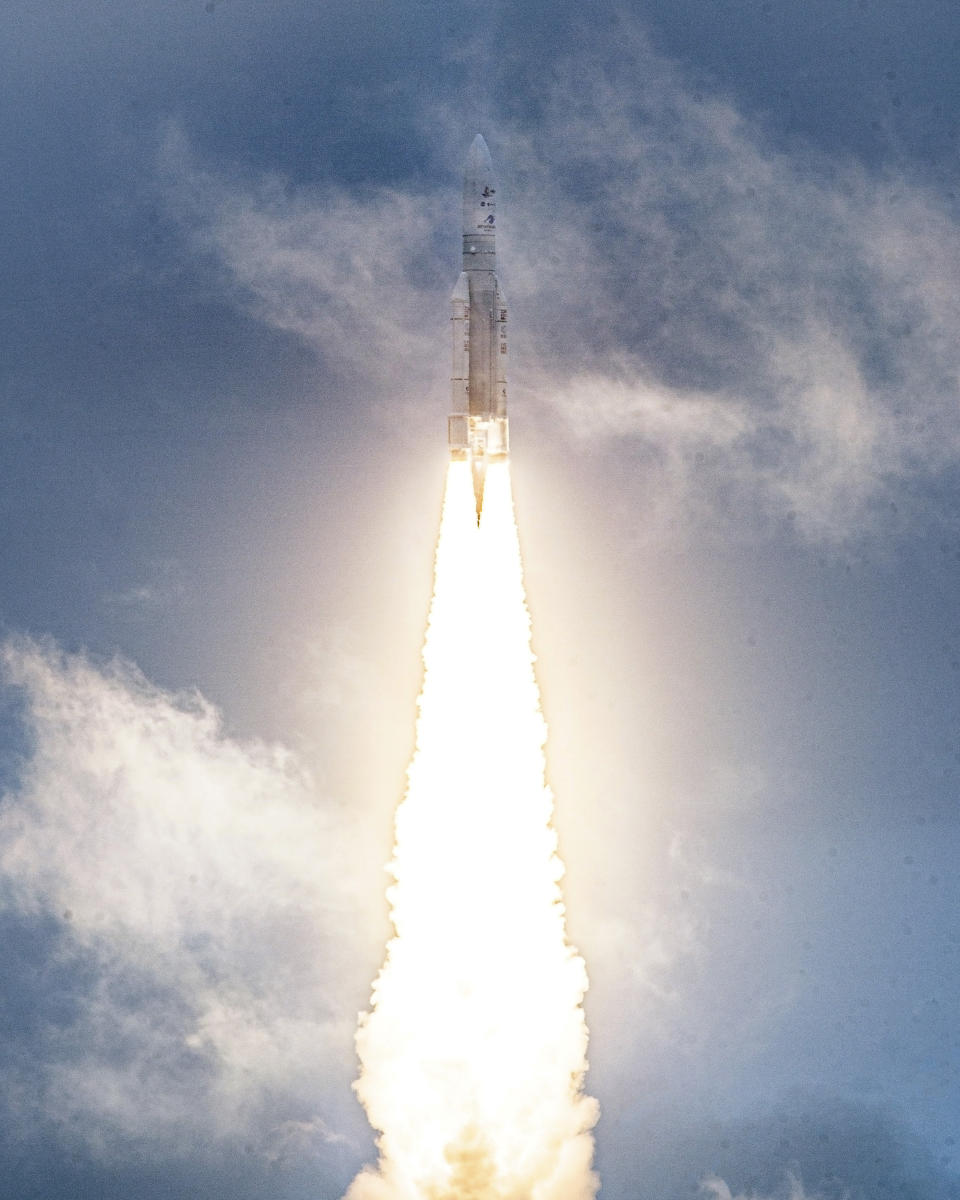 In this image released by NASA, Arianespace's Ariane 5 rocket with NASA's James Webb Space Telescope onboard, lifts off Saturday, Dec. 25, 2021, at Europe's Spaceport, the Guiana Space Center in Kourou, French Guiana. The $10 billion infrared observatory is intended as the successor to the aging Hubble Space Telescope. (Chris Gunn/NASA via AP)