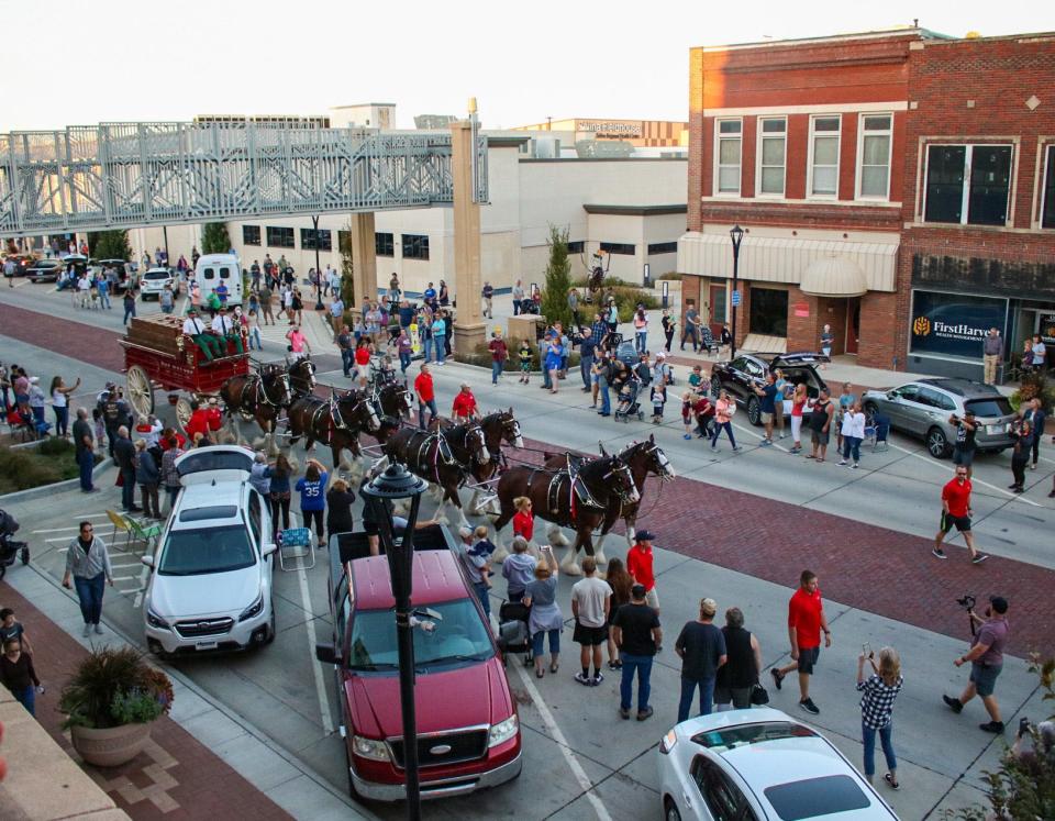 The Budweiser Clydesdales make their way down Santa Fe Avenue in Salina Sept. 28.