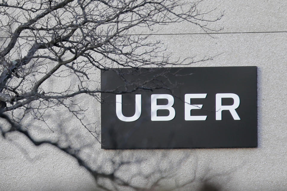 FILE - In this Nov. 15, 2019, file photo is an Uber office in Secaucus, New Jersey, USA. The U.K. Supreme Court has ruled Friday Feb. 19, 2021, that Uber drivers should be classed as “workers” and not self employed, threatening the Californian company's business model and holds broader implications for the so-called gig economy. (AP Photo/Seth Wenig, File)