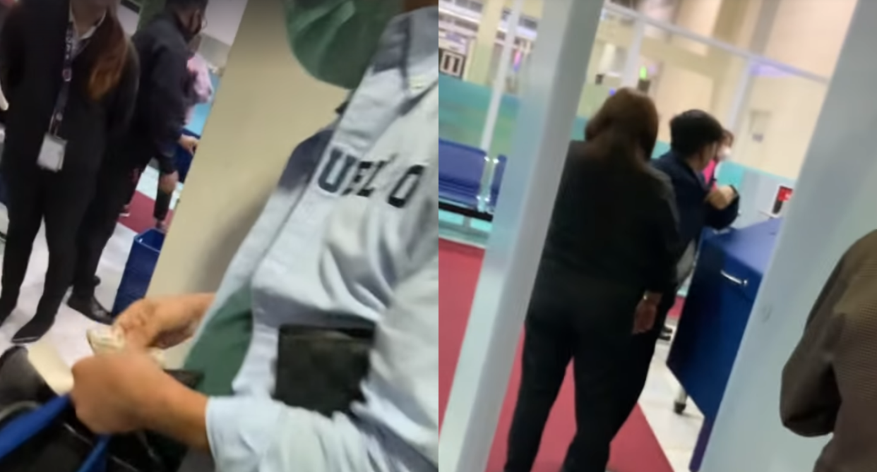 The viral video showed an Philippine airport security officer inserting something into the jacket of a fellow staff at the security checkpoint which, according to a witness, was the cash taken from fellow tourist Kitja Thabthim. (Photo credits: Piyawat Gunlayaprasit/Facebook)
