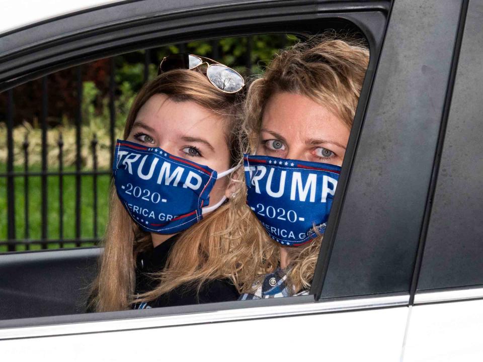 Protesters drive in a caravan of cars that descended on the Maryland statehouse in Annapolis on April 18, during the Governor's stay-at-home order. | Peter van Agtmael—Magnum Photos for TIME