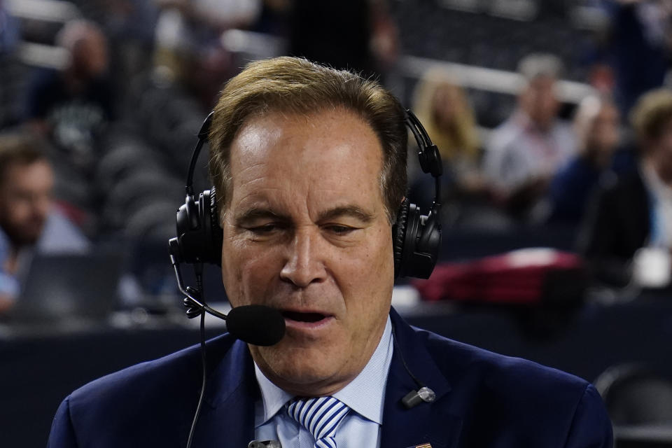 Jim Nantz works during the Florida Atlantic and San Diego State Final Four college basketball game in the NCAA Tournament on Saturday, April 1, 2023, in Houston. Nantz's near four-decade career covering March Madness ends after Monday's final between UConn and San Diego State. (AP Photo/Brynn Anderson)