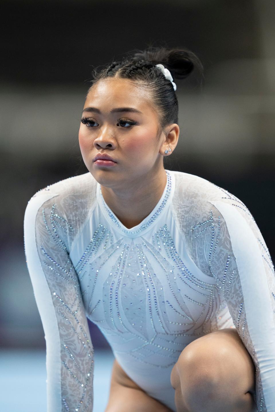 Sunisa Lee stretches during the 2023 U.S. Gymnastics Championships.