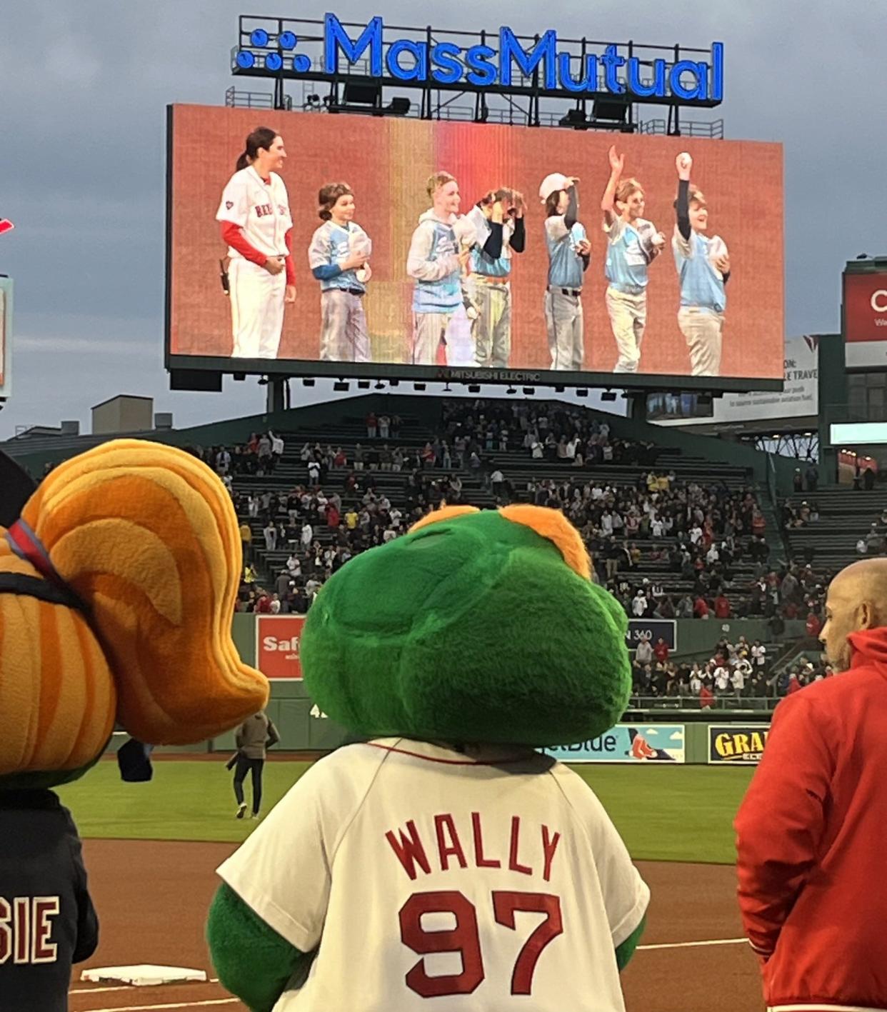 The Exeter Cal Ripken team of 12-and-under baseball players made an appearance on the field at Fenway Park in Boston, shaking hands with Red Sox players, Wednesday, April 17, 2024.