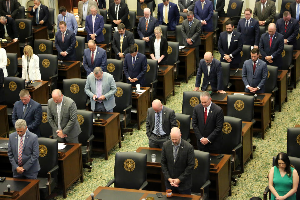 Oklahoma House members pray on June 12 before a special session of the House at the Oklahoma state Capitol.