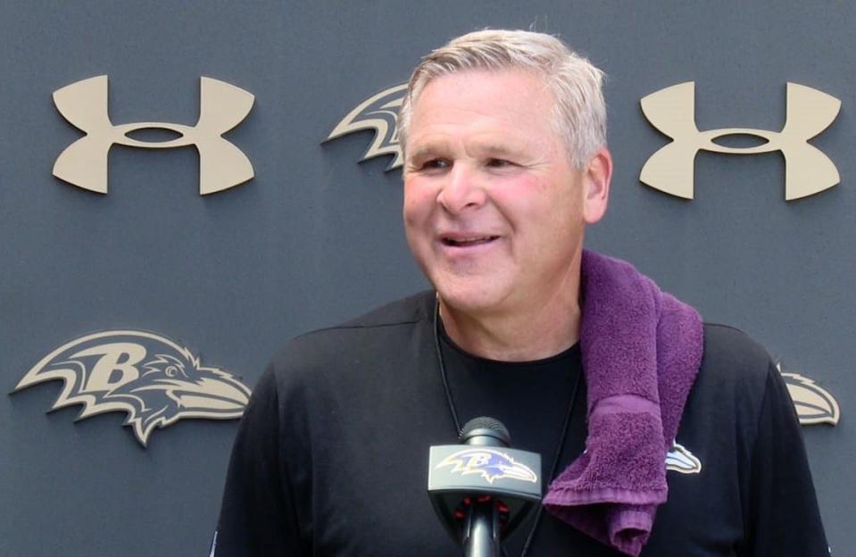 Baltimore Ravens offensive line coach Joe D'Alessandris speaks with reporters.