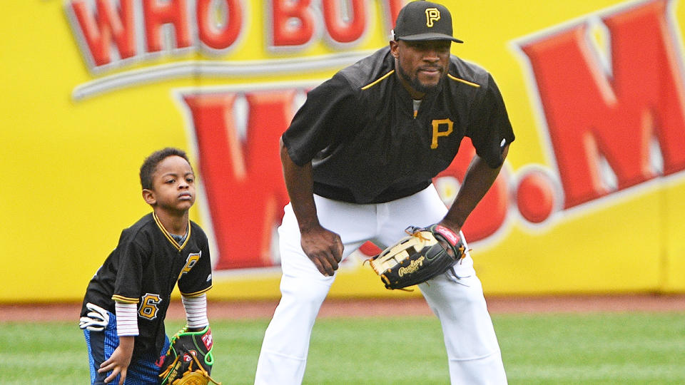 Starling Marte, pictured here with son Smerling before a Pittsburgh Pirates game in 2017.