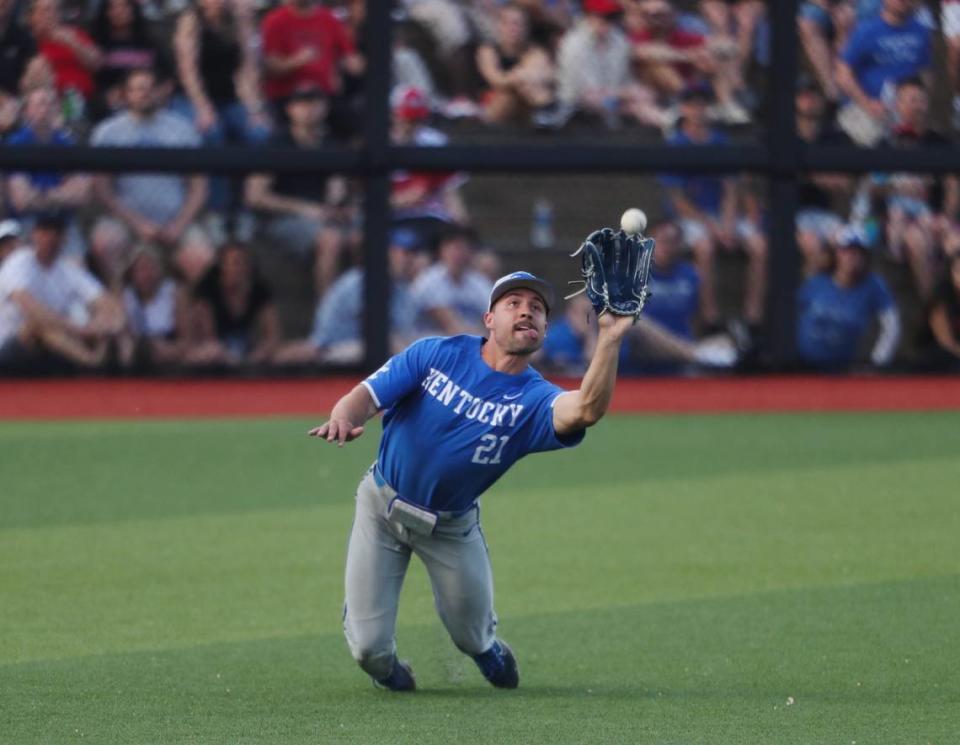 Ryan Waldschmidt catches a pop fly to close out an inning against Louisville on Tuesday night. The ball was in play most of the night, with Louisville collecting 18 hits and Kentucky 15.