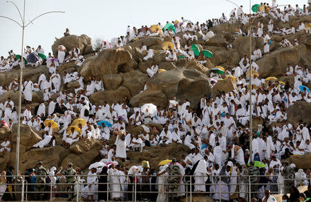 Muslim pilgrim gather on Mount Mercy on the plains of Arafat during the annual haj pilgrimage, outside the holy city of Mecca, Saudi Arabia August 20, 2018. REUTERS/Zohra Bensemra