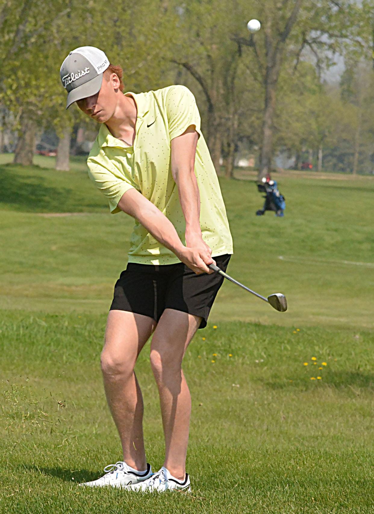 Lane Tvedt of Castlewood chips to No. 5 Yellow during the Pre-Region 1B/Eastern Coteau Conference golf tournament on Monday, May 13, 2024 at Cattail Crossing Golf Course. Tvedt shot a 70 to win medalist honors in the boys division.