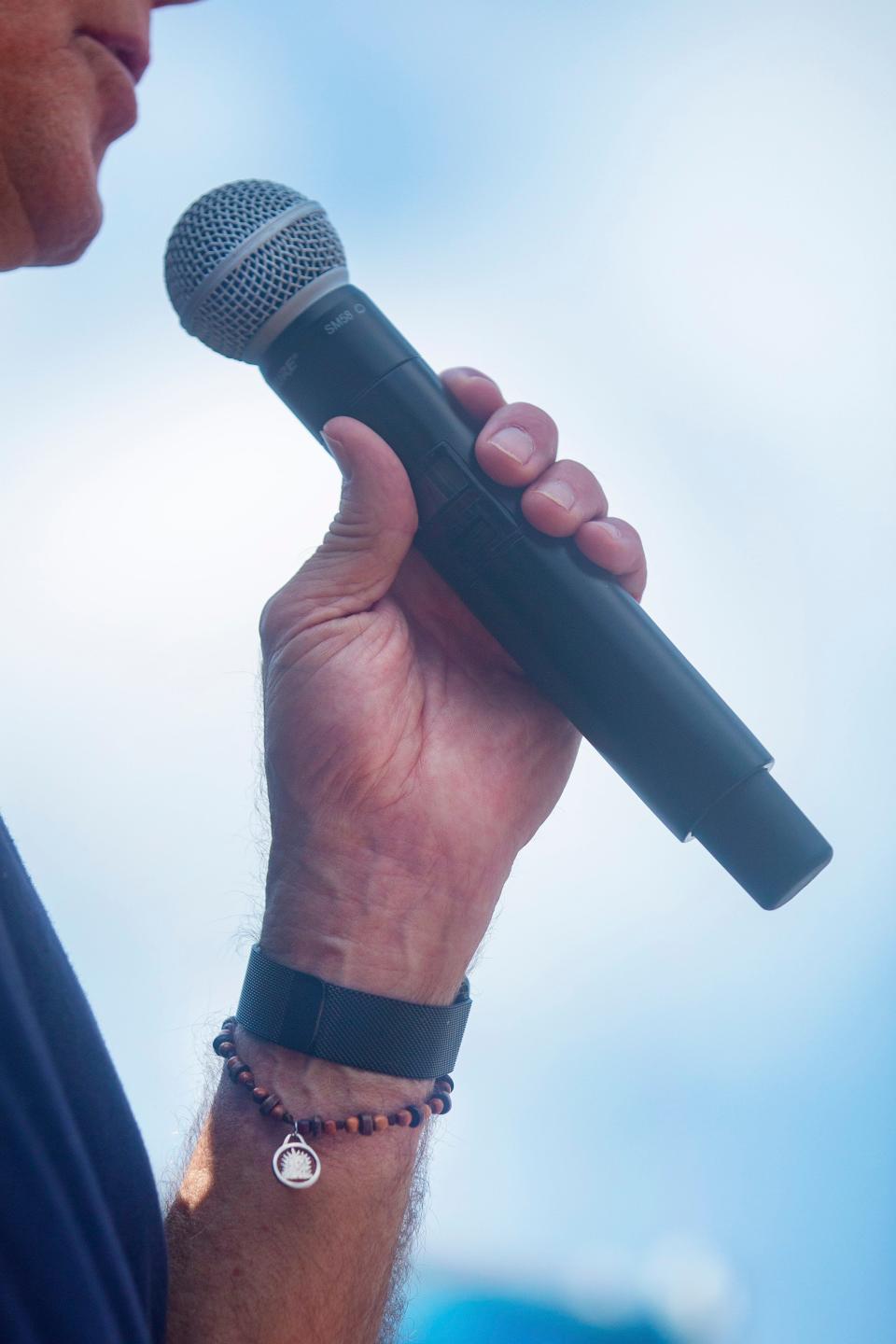 2020 Democratic presidential candidate Joe Biden wears a beaded bracelet during his speech at the Iowa State Fair on August 8, 2019.