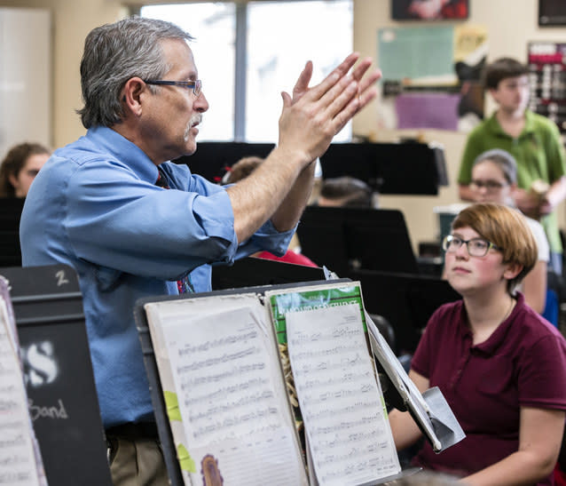 Band teacher talking to the class