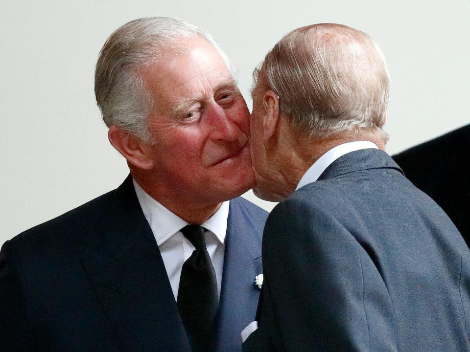 Prince Charles kisses his father Prince Philip in 2017.