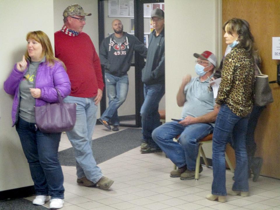 Before the Dodge City Commission votes on a mask mandate Nov. 16, residents are allowed inside the lobby of City Hall to speak to commissioners. Residents who went in to speak had to wear a mask.