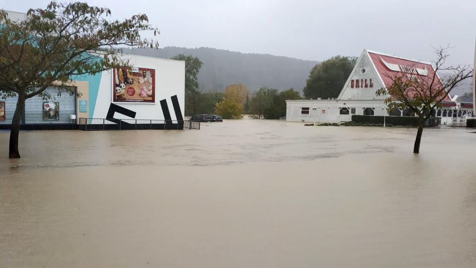 This photo taken Sunday Nov. 24, 2019, by VAR region firefighters, showing the flooded streets of Trans-en-Provence, southern France. Flooding pounded France and Italy amid heavy rains over the weekend, leaving at least three dead and a stretch of elevated highway collapsed by a landslide, officials said Sunday. The weather has trapped travellers, downed trees and unleashing mudslides in parts of both countries. (Pompiers du Var via AP)